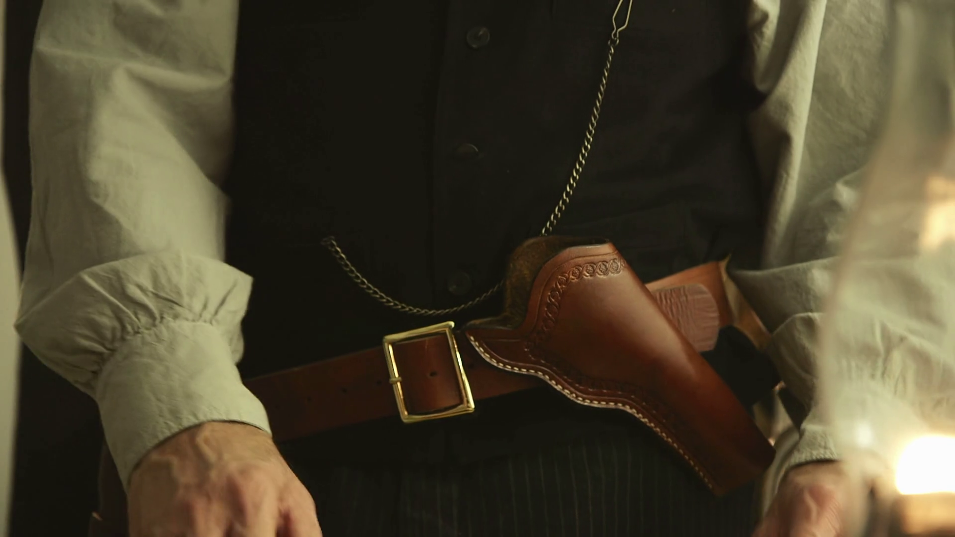 Old West Cowboy Loading Pistol In Cross Draw Stock Footage SBV ...