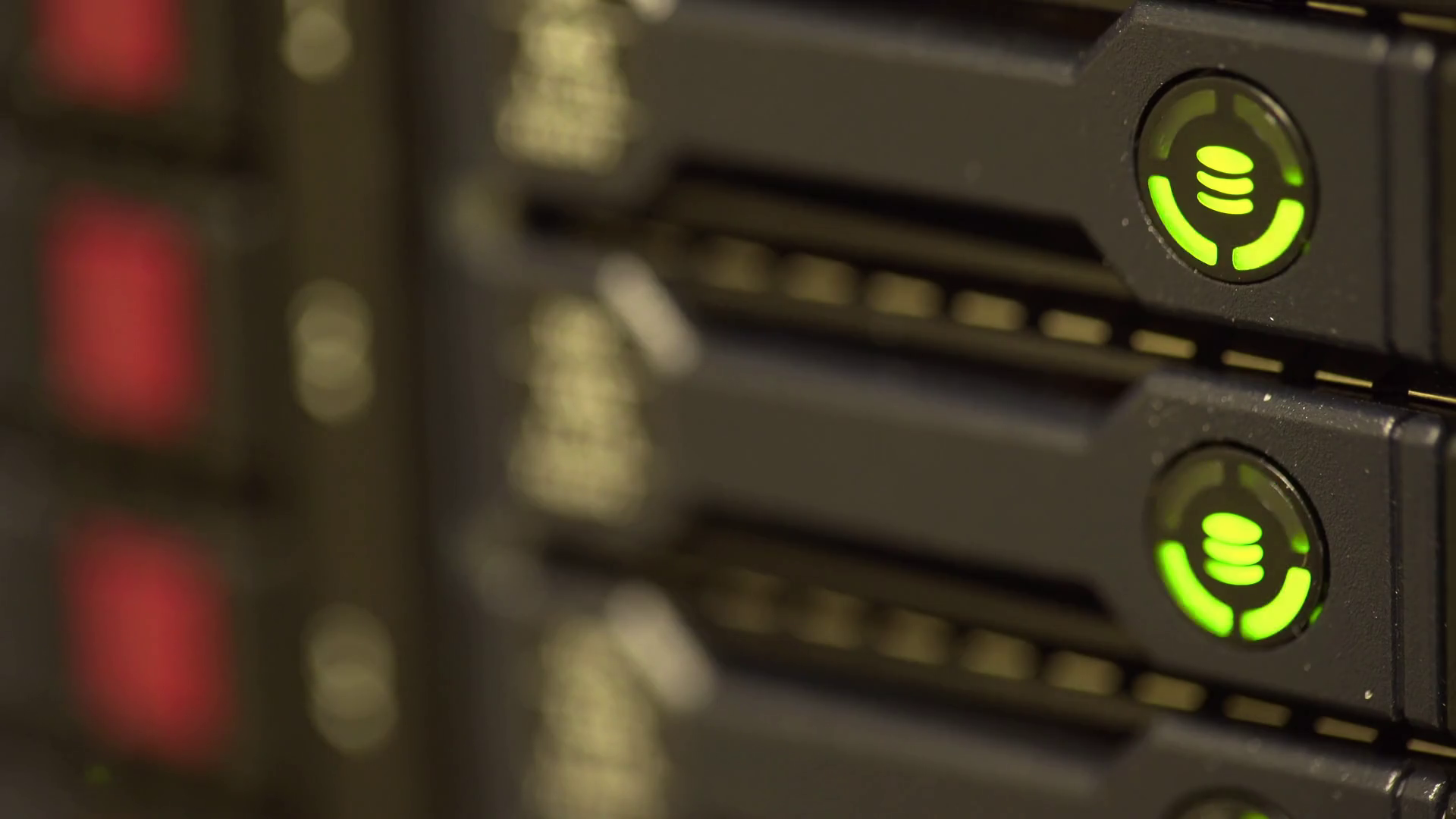 shallow depth of field hard drive lights blinking on a server Stock