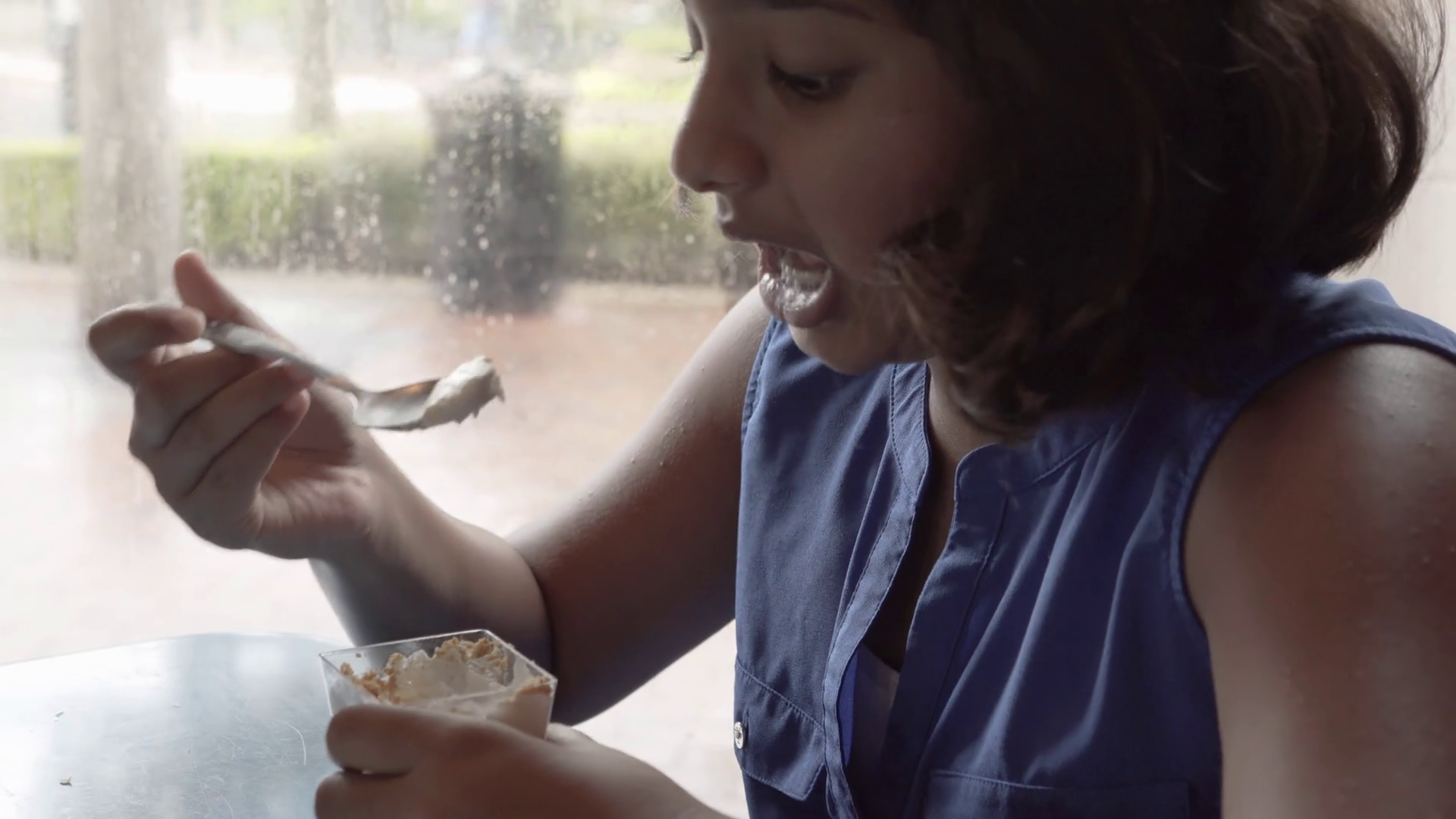 Cute Little Girl Eating Dessert In A Restaurant Stock Video Footage
