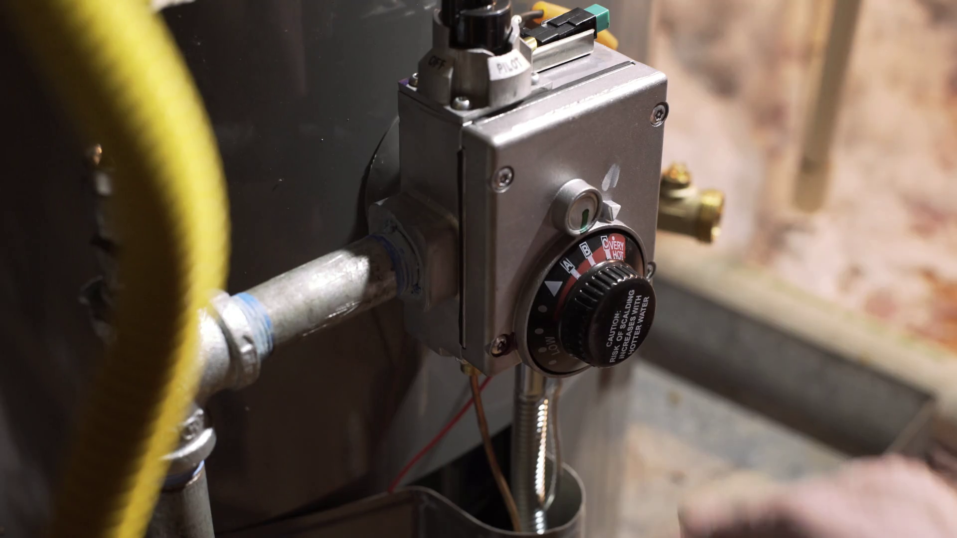 Homeowner Reducing Water Heater Temperature Stock Footage SBV319178717