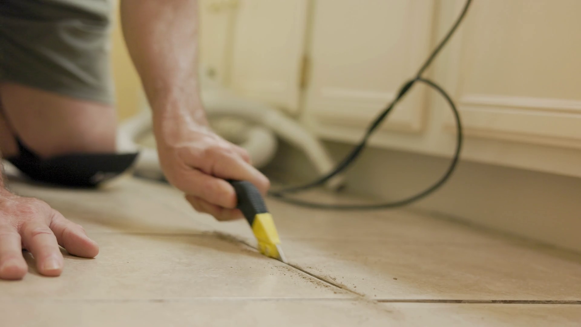 Homeowner Removing Grout Vacuuming Debris Stock Footage SBV348410857