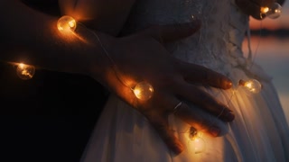 Romantic Wedding Couple Embracing In Darkness, Closeup View Of Hand Of Groom Stroking Bride Body