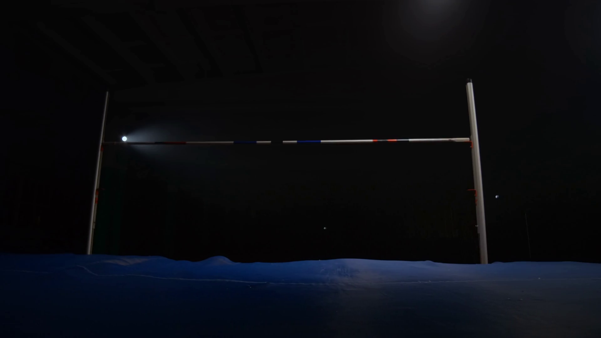 A Male Athlete Runs Jumps High Over Crossbar Stock Footage SBV