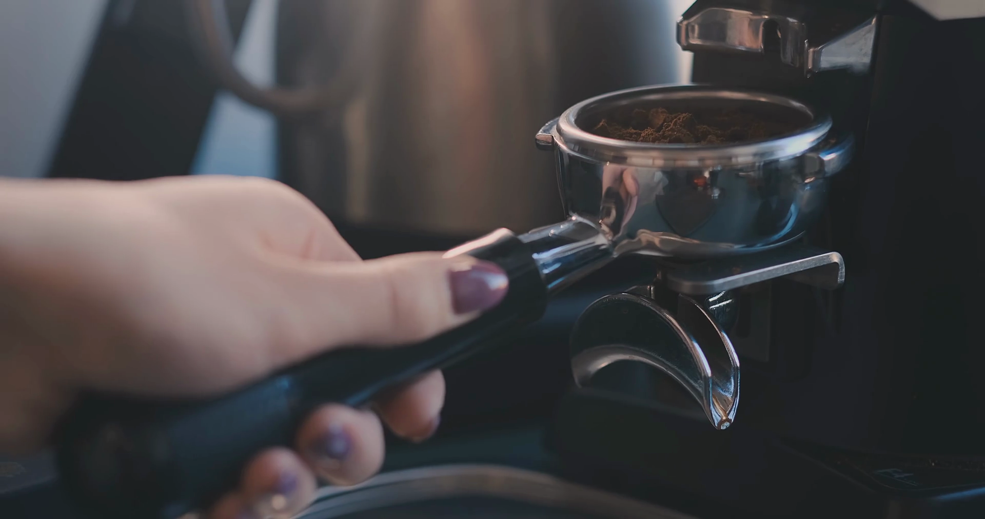 Making Ground Coffee with Tamping fresh coffee. CloseUp. Making coffee