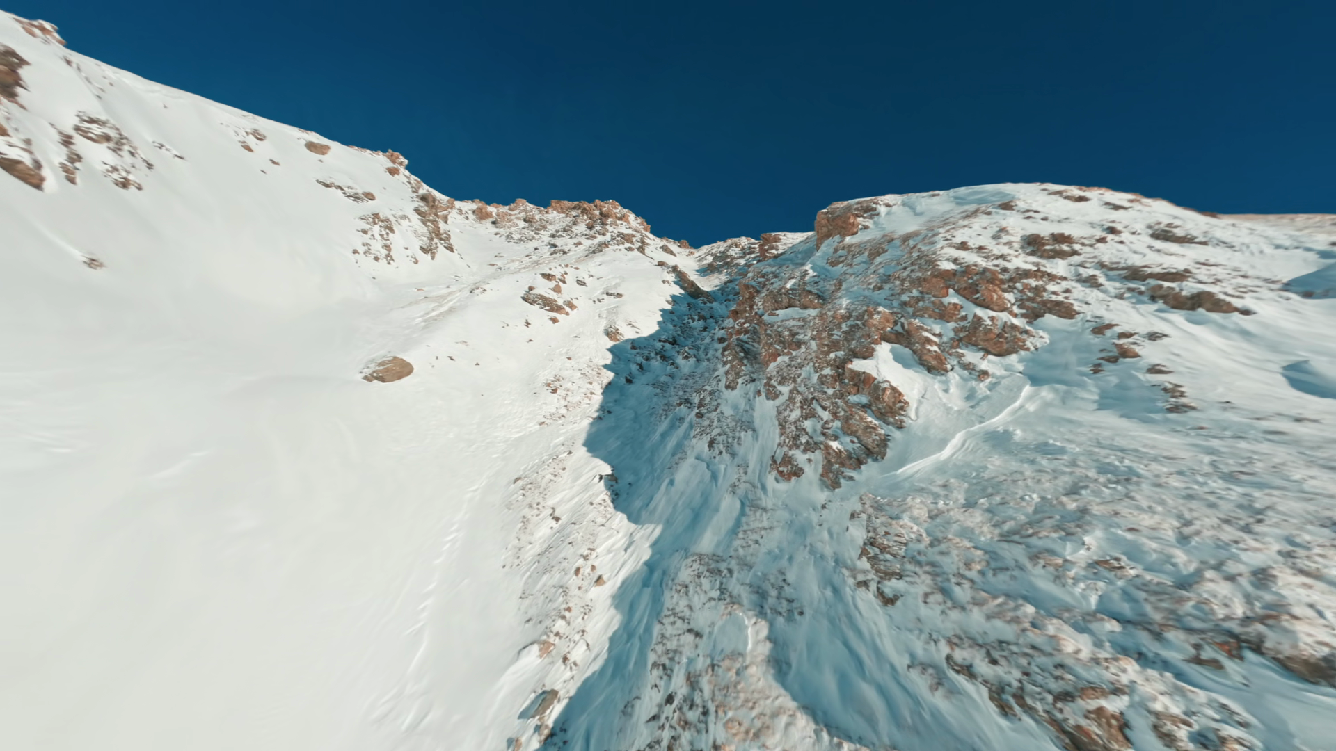 Fpv Drone Crossing High Alpine Ridges Shaped Stock Footage SBV ...