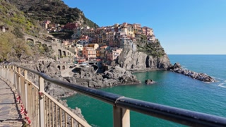 vibrant colors of manarola under the midday sun