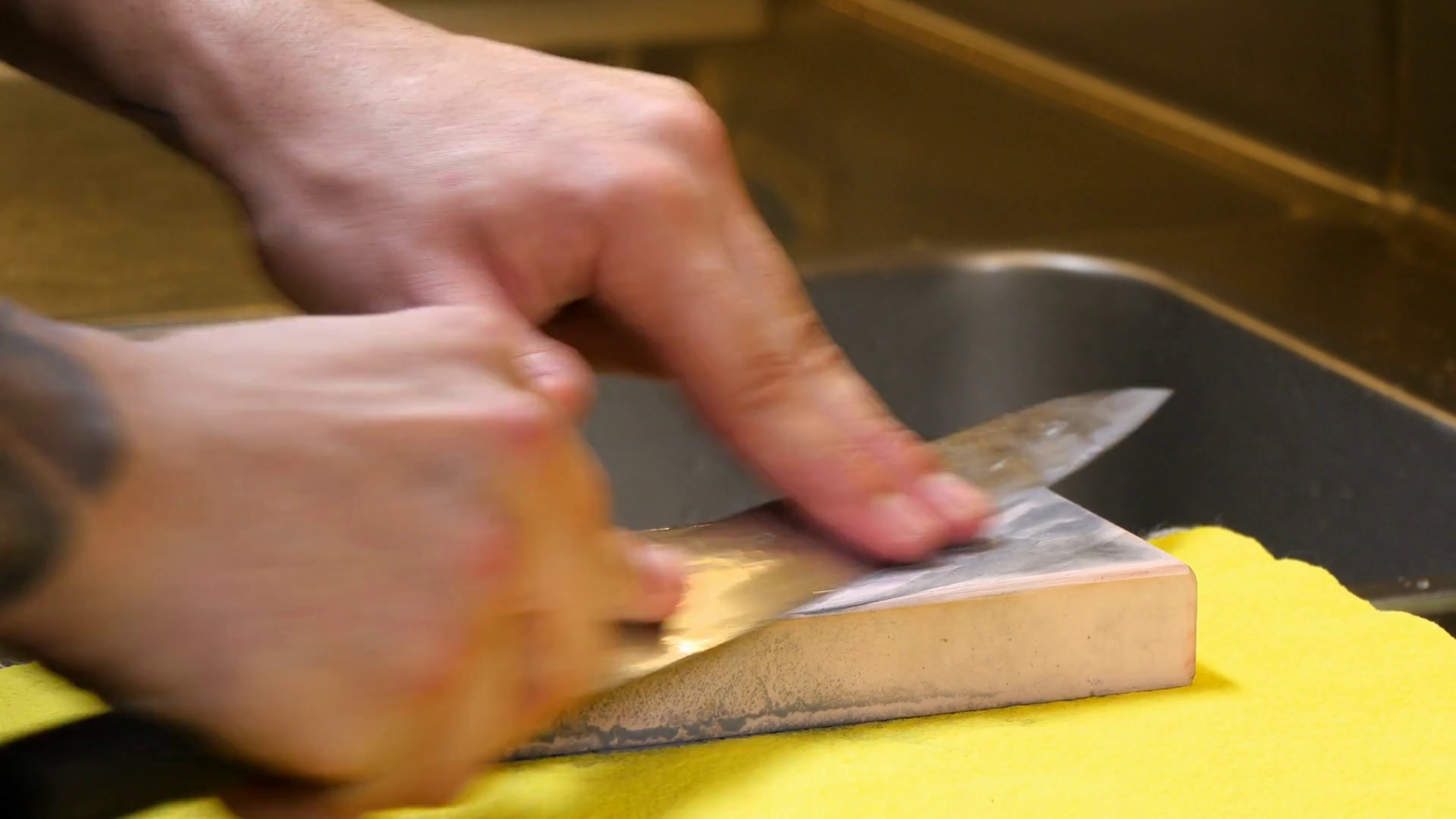 Sushi Chef Sharpening Knife With Pink Stone Stock Footage SBV347416416