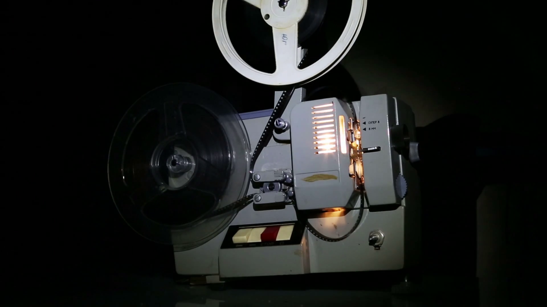 Old Projector Showing Film Dolly Shot Stock Footage SBV347373360