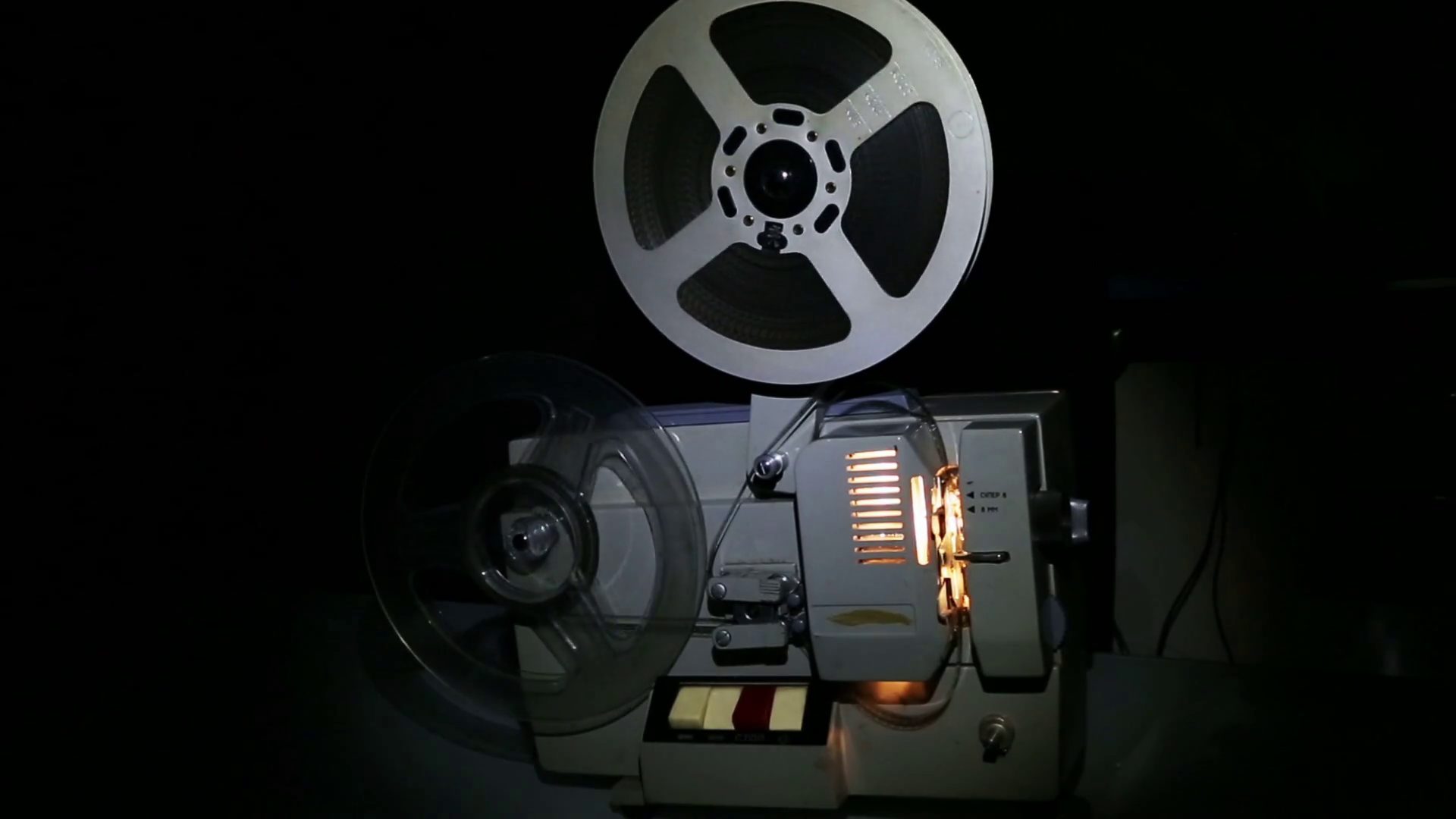 Old Projector Showing Film Dolly Shot Stock Footage SBV347373365