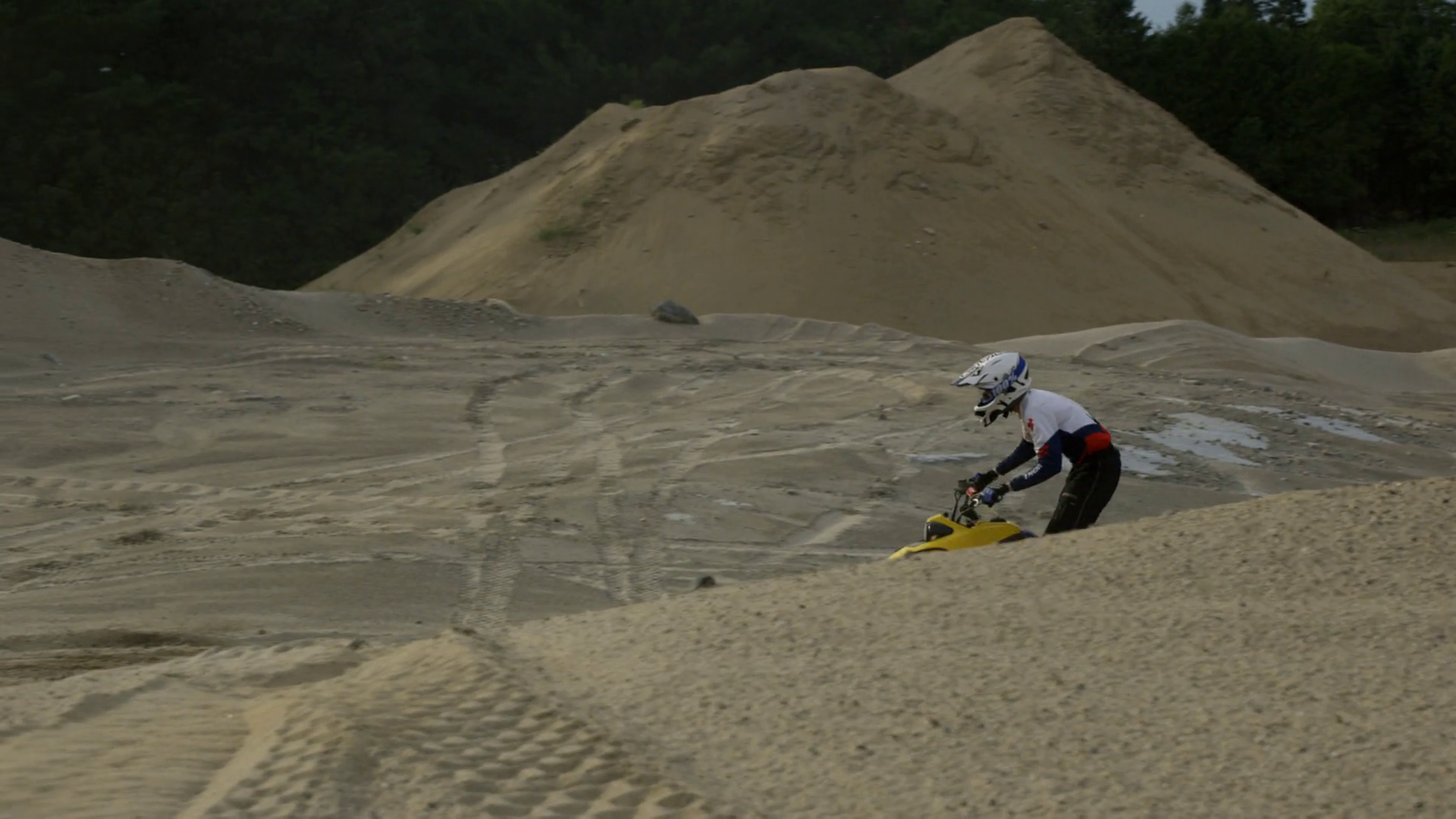 Atv 4 Wheeler Rider Jumps Small Jump In Stock Footage SBV348387506 Storyblocks