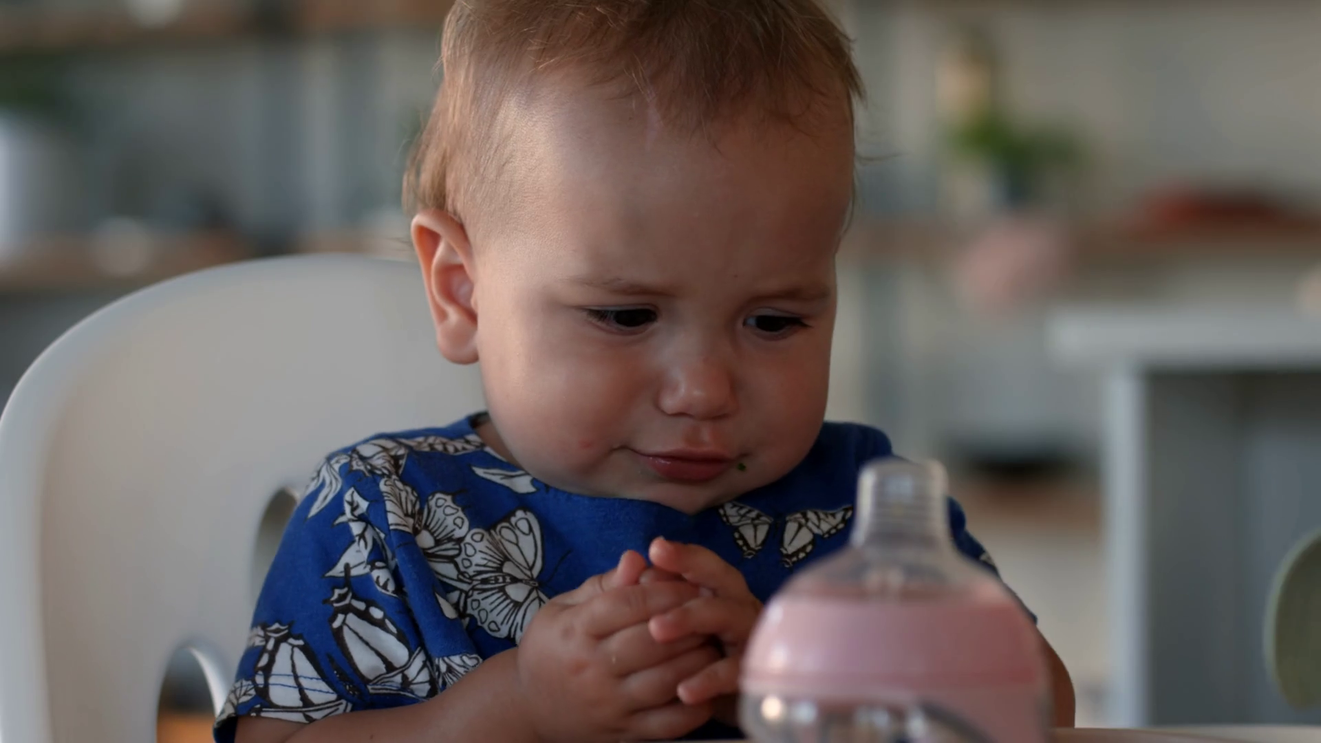 Baby Girl Being Fussy Eating In High Chair Stock Footage SBV347462813