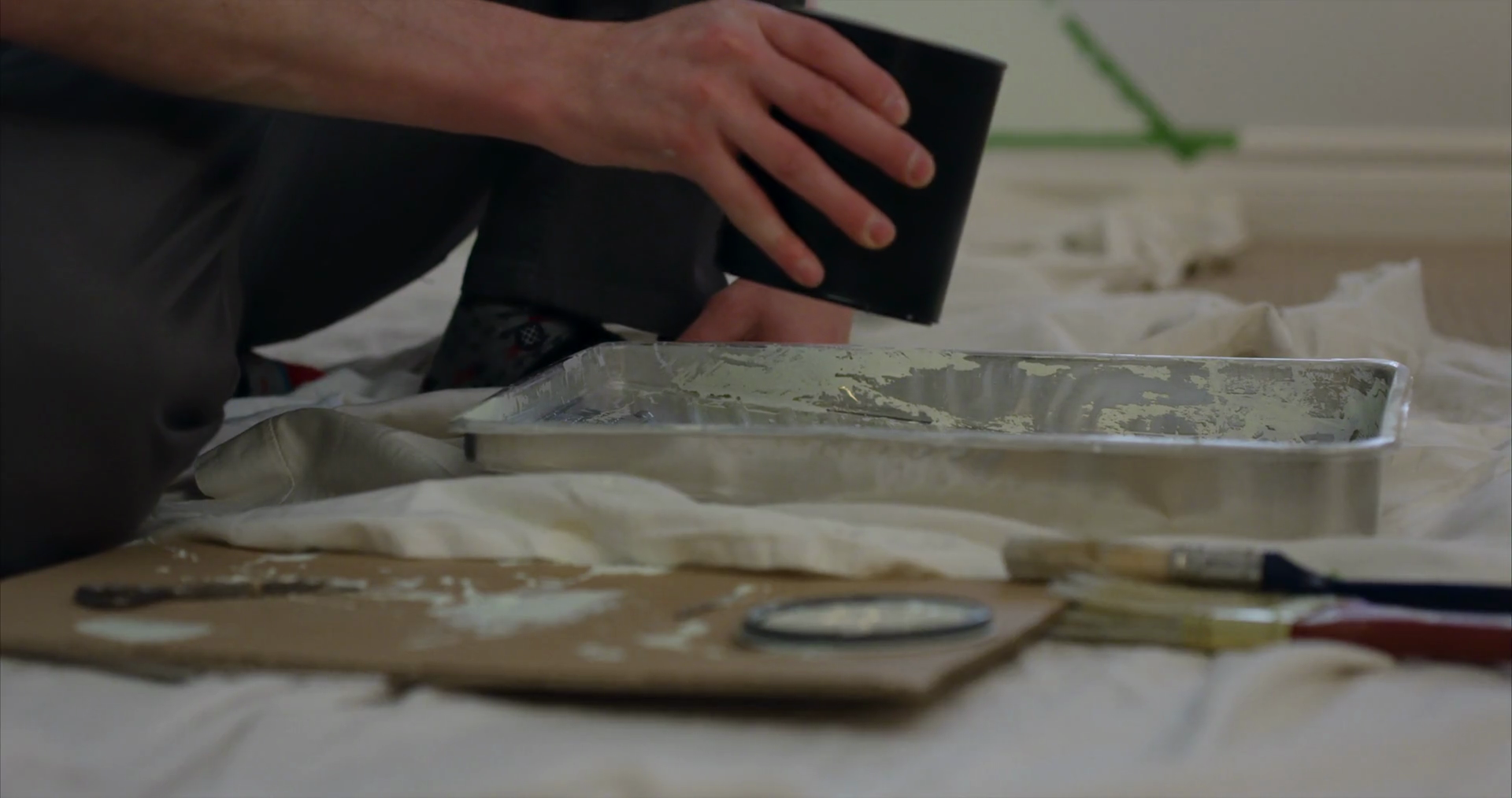 Man Pouring Paint Into Paint Tray Slow Stock Footage SBV348450689 Storyblocks