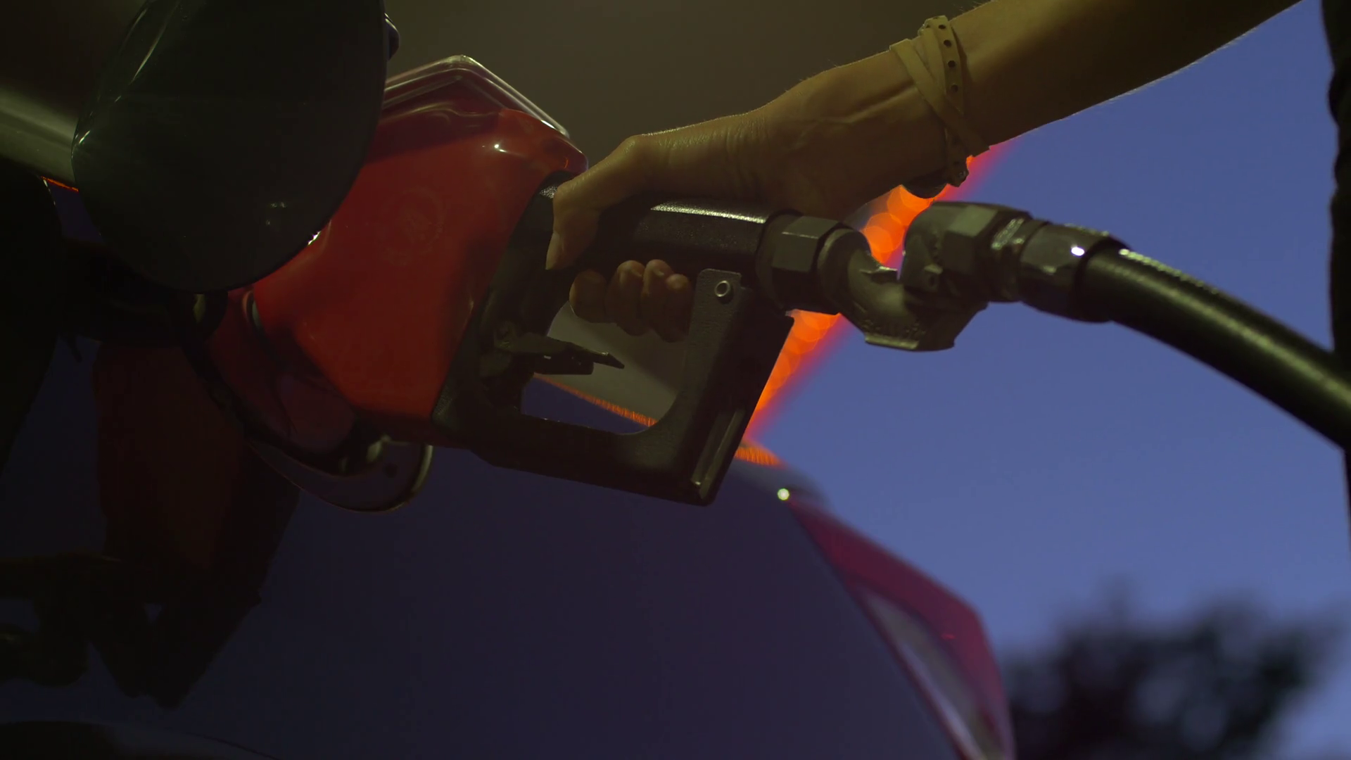 Woman Hand Takes Gas Pump Out Of Car Stock Footage SBV347309385