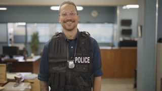 Friendly Neighbourhood Police Officer Smiling At The Camera