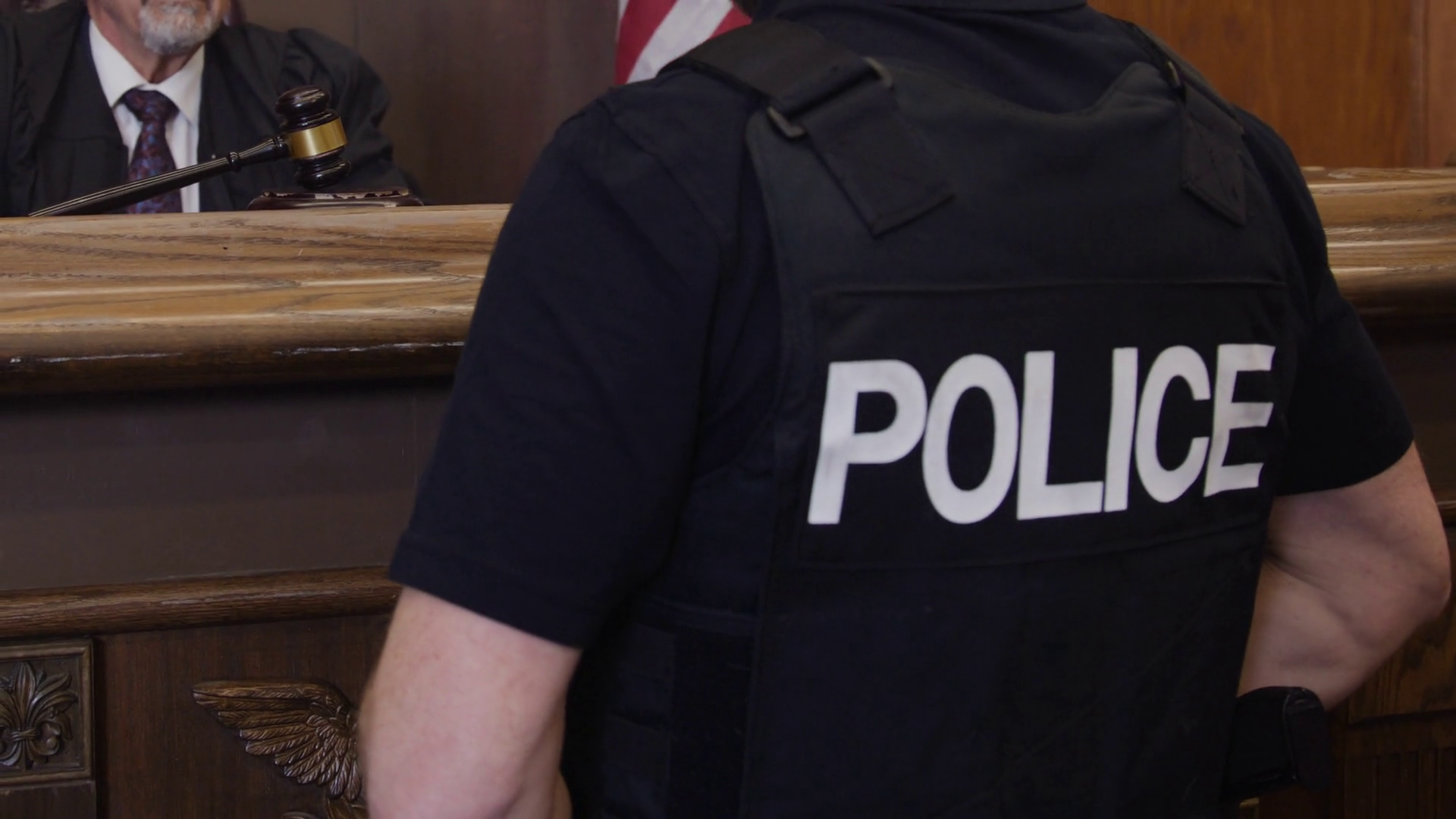 Back View Of Police Officer Talking To Judge Stock Footage SBV ...