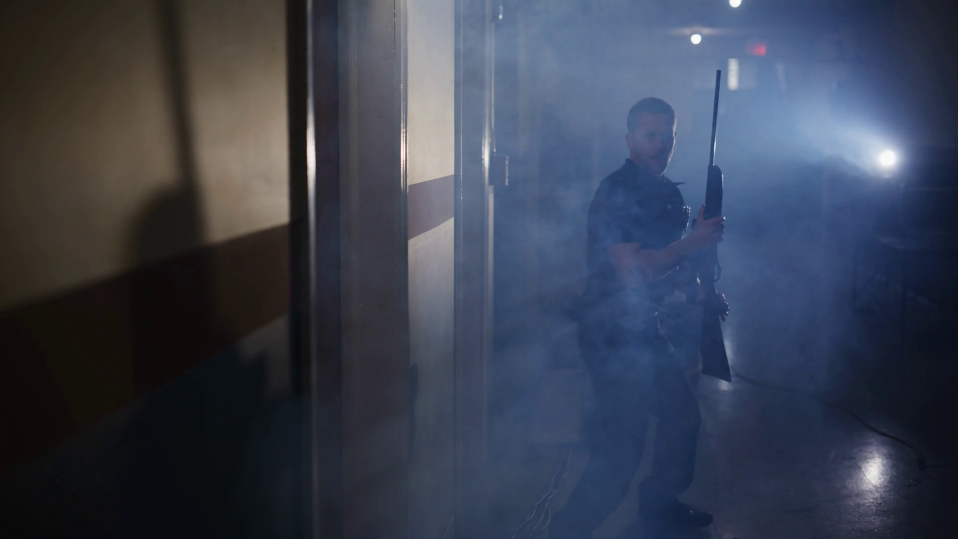 Police Officer With Gun In Foggy Hallway Stock Footage SBV-351672040 ...