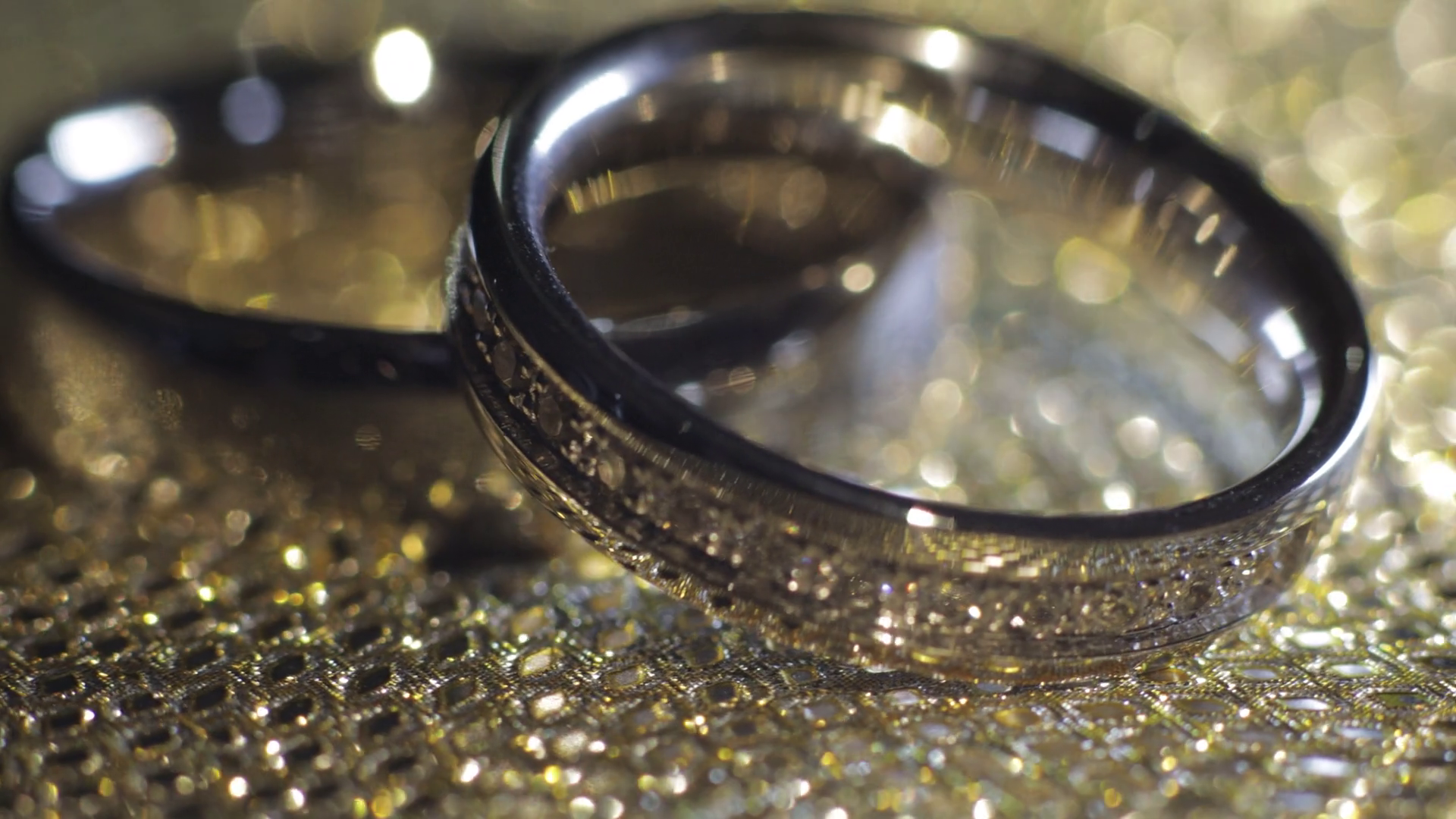 Wedding Rings Lying Rotate Spinning On Shiny Stock Footage SBV ...