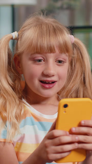 Child kid lady use smartphone, playing game loses surprised lottery result fail education study test