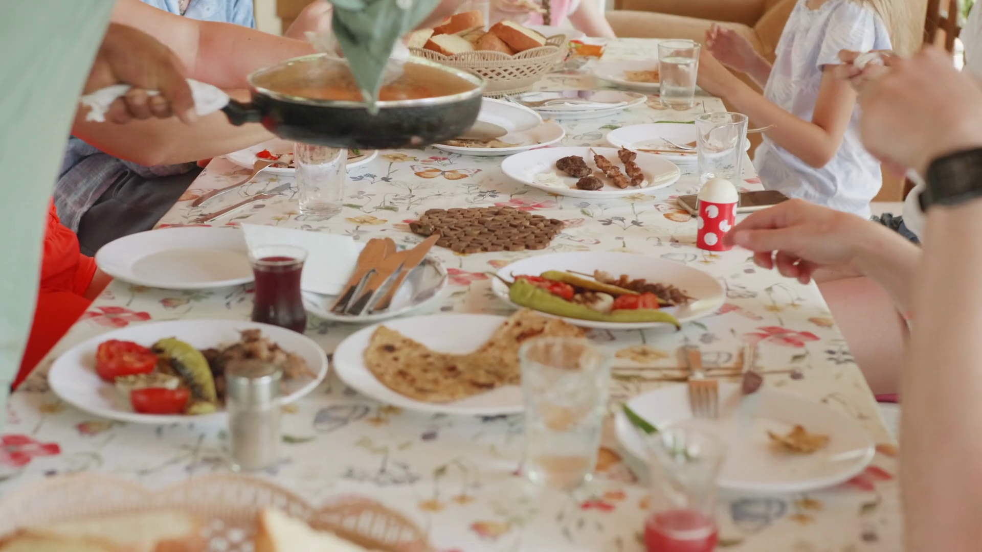 Dishes with homemade food dining table. Friendly family gathering ...