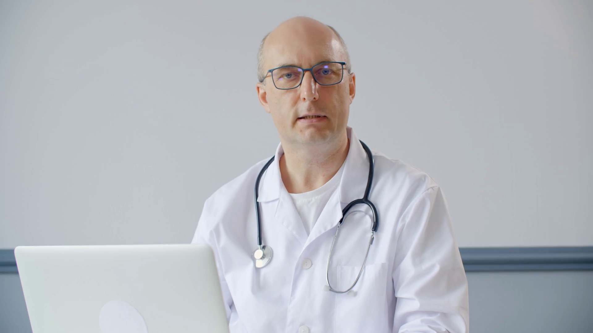 Serious Male Doctor Using Laptop Computer Stock Footage SBV-338439497 ...
