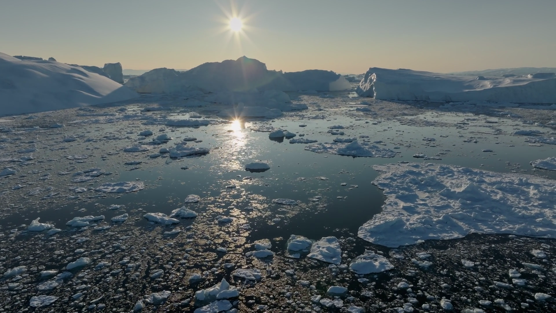 Aerial View Of Setting Sun Over Icebergs Stock Footage SBV-352364357 ...