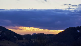 Title: Winter Twilight Mountain Timelapse with Dramatic Clouds
