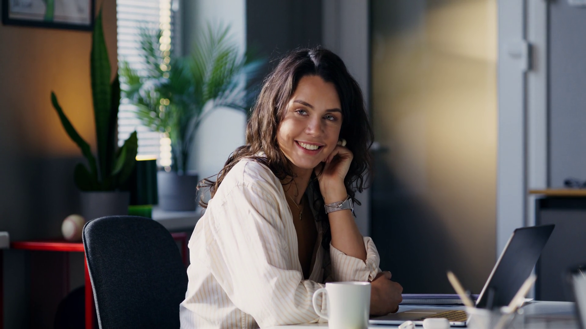 A Young Woman Smiles At Camera She's Sitting Stock Footage SBV ...
