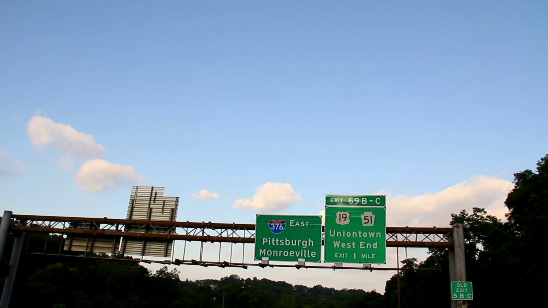 Monroeville and Pittsburgh Road Sign Overhead Stock Video Footage 0016