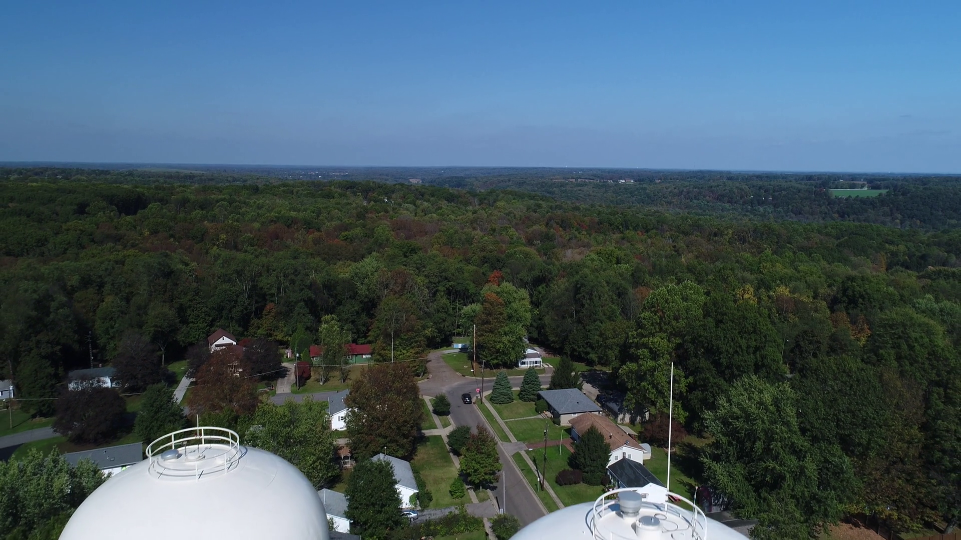 A dramatic reverse aerial establishing shot of two Salem, Ohio water
