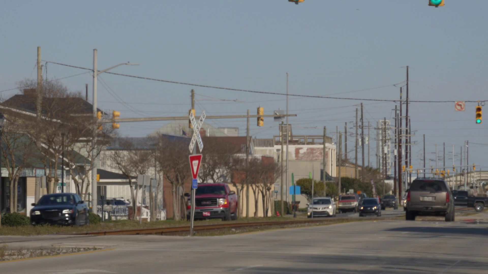 Long shot view of traffic passing on Arendell Street in downtown