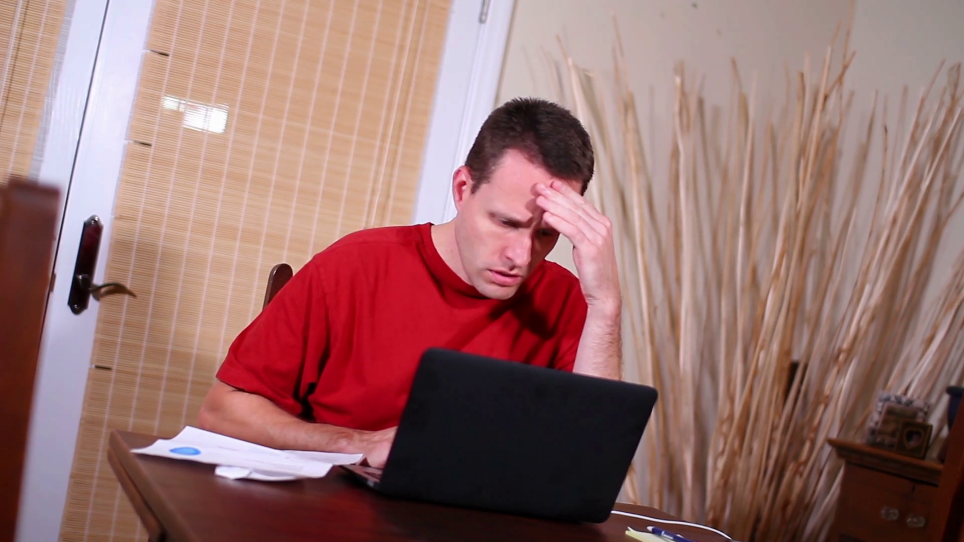 A Canted Dolly Shot View Of Distraught Man Stock Footage SBV-349205568 ...