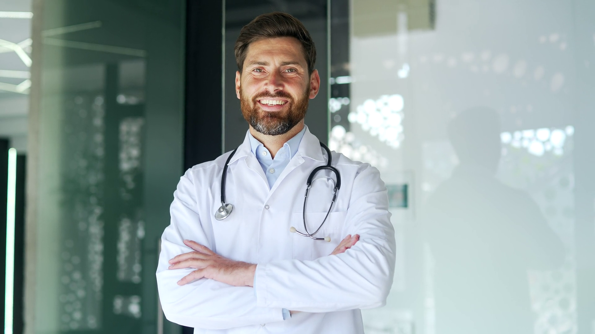 Portrait Of Confident Smiling Bearded Doctor Stock Footage SBV ...