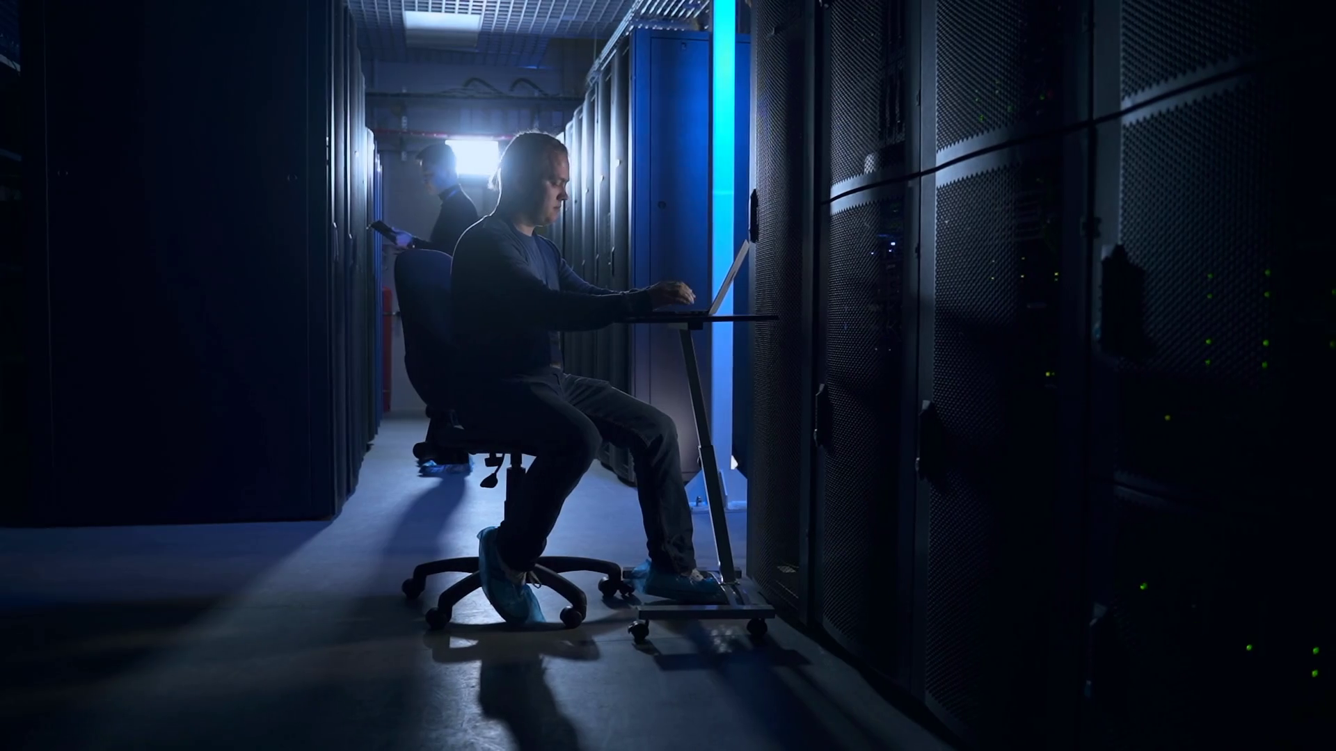 Team of engineers working with devices and checking hardware at big