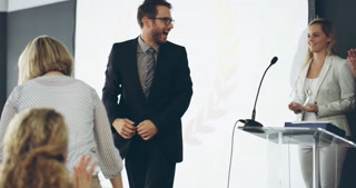 Successful, winning and celebrating an award won by best employees of the year at a ceremony