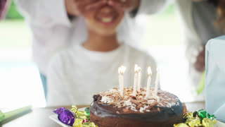Birthday party, cake and happy family child, surprise and celebrate childhood memory event with excited son