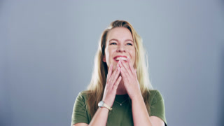 Happy, face and woman laughing in a studio for funny, comic and silly joke in conversation