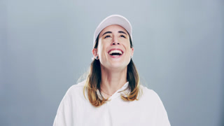 Funny, face and woman laughing in a studio for comic or silly joke in conversation with happiness