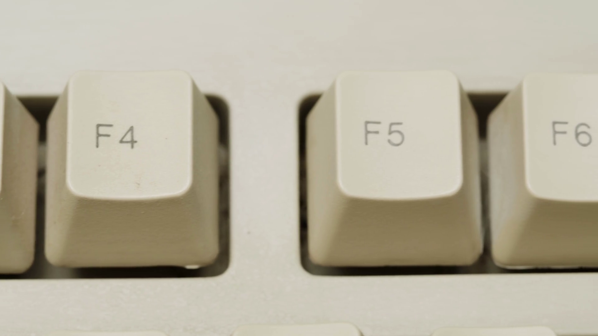 Old retro keyboard closeup. Computer buttons top view. Stock Video