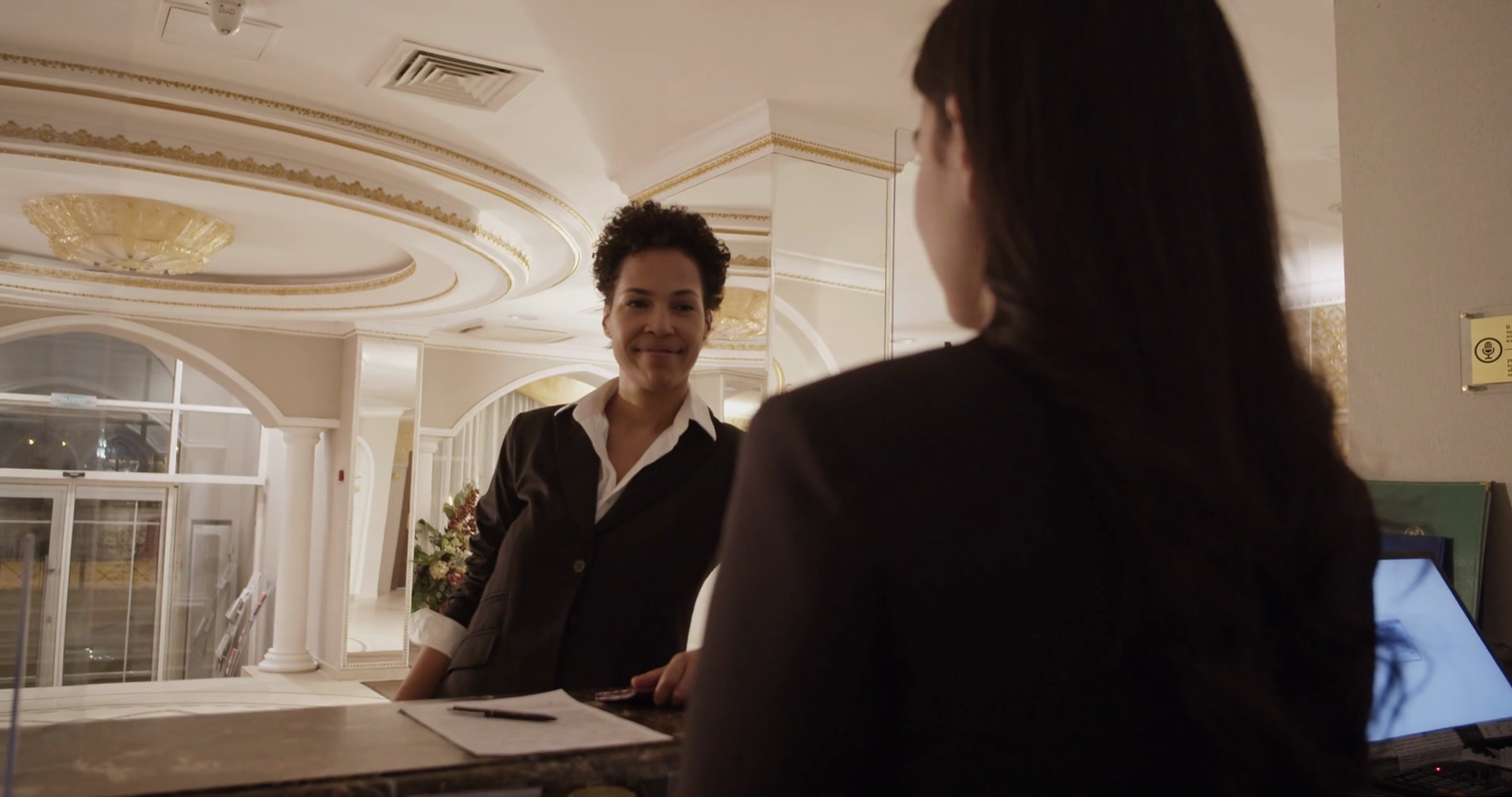 Female Concierge Communicating With Ethnic Stock Footage SBV-347527584 ...