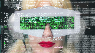 female with video glasses with glitching code on the screen