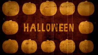 Animated pumpkins moving with glitches on screen with word Halloween in the centre
