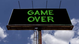outdoor advertising board with arcade game over on the screen