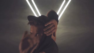 man dancing in smoke