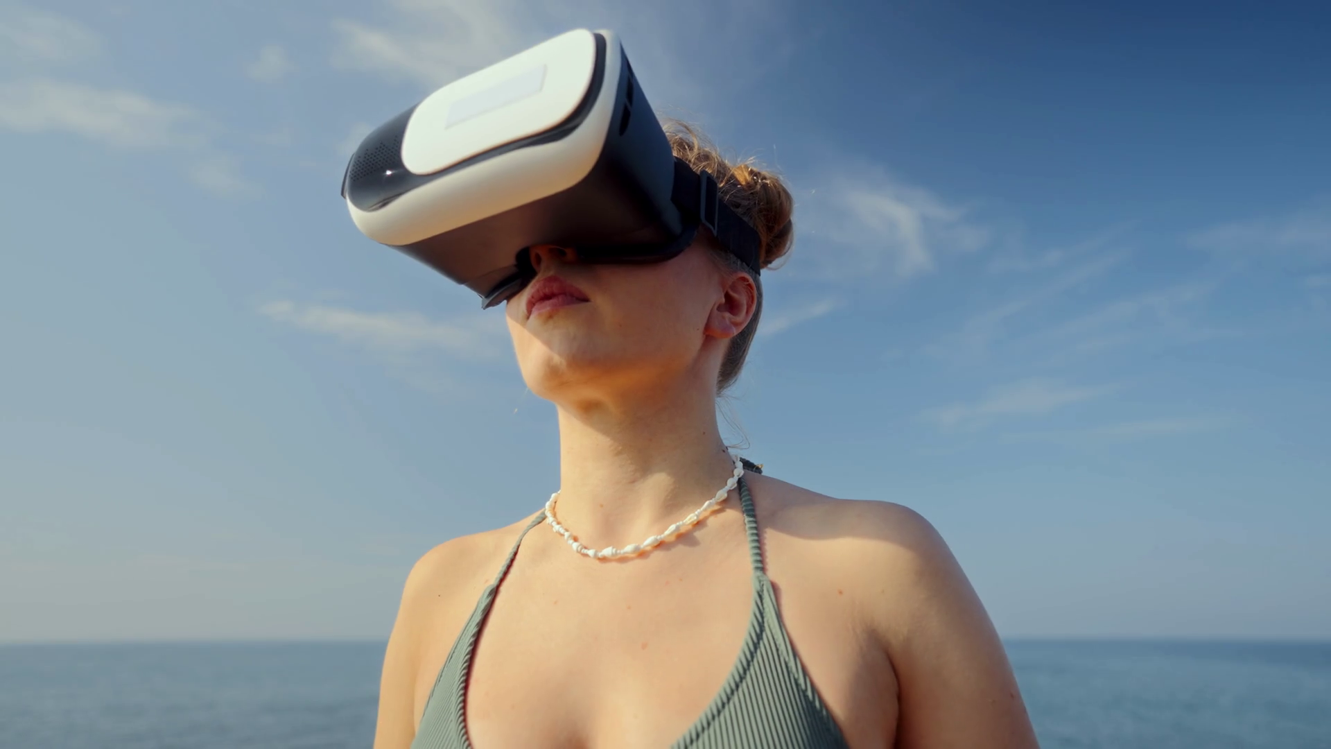 Woman In Vr Headset Explores Virtual Beach Stock Footage SBV-348812504 ...