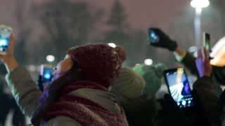 Christmas concert recording: Young people partying at New Year on city square musical show