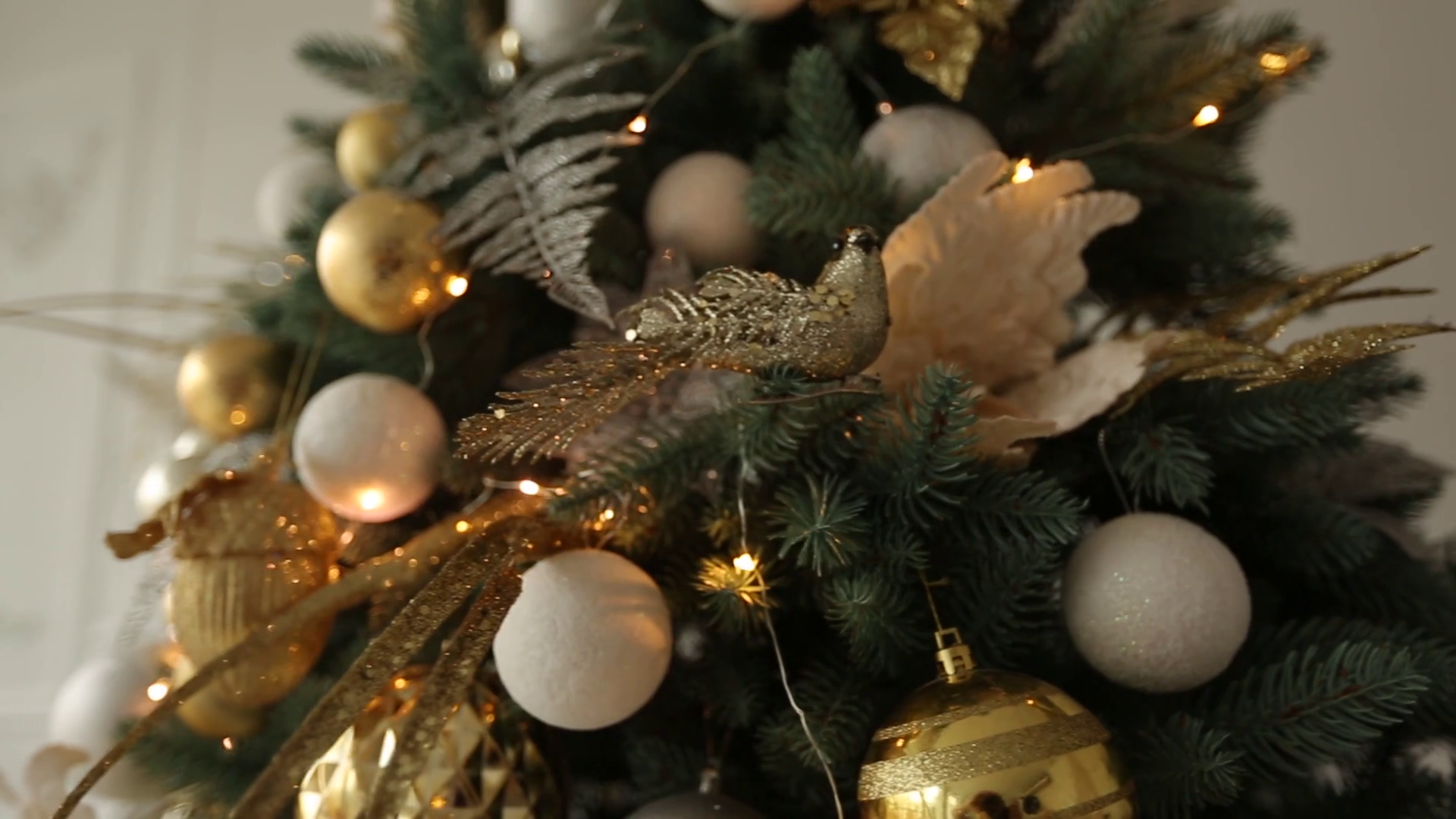 Stylish White Christmas Interior With Decorated Fir Trees Fireplace Lanterns Lamps Candles Wreath Bumps And Gifts Stock Video Footage Storyblocks