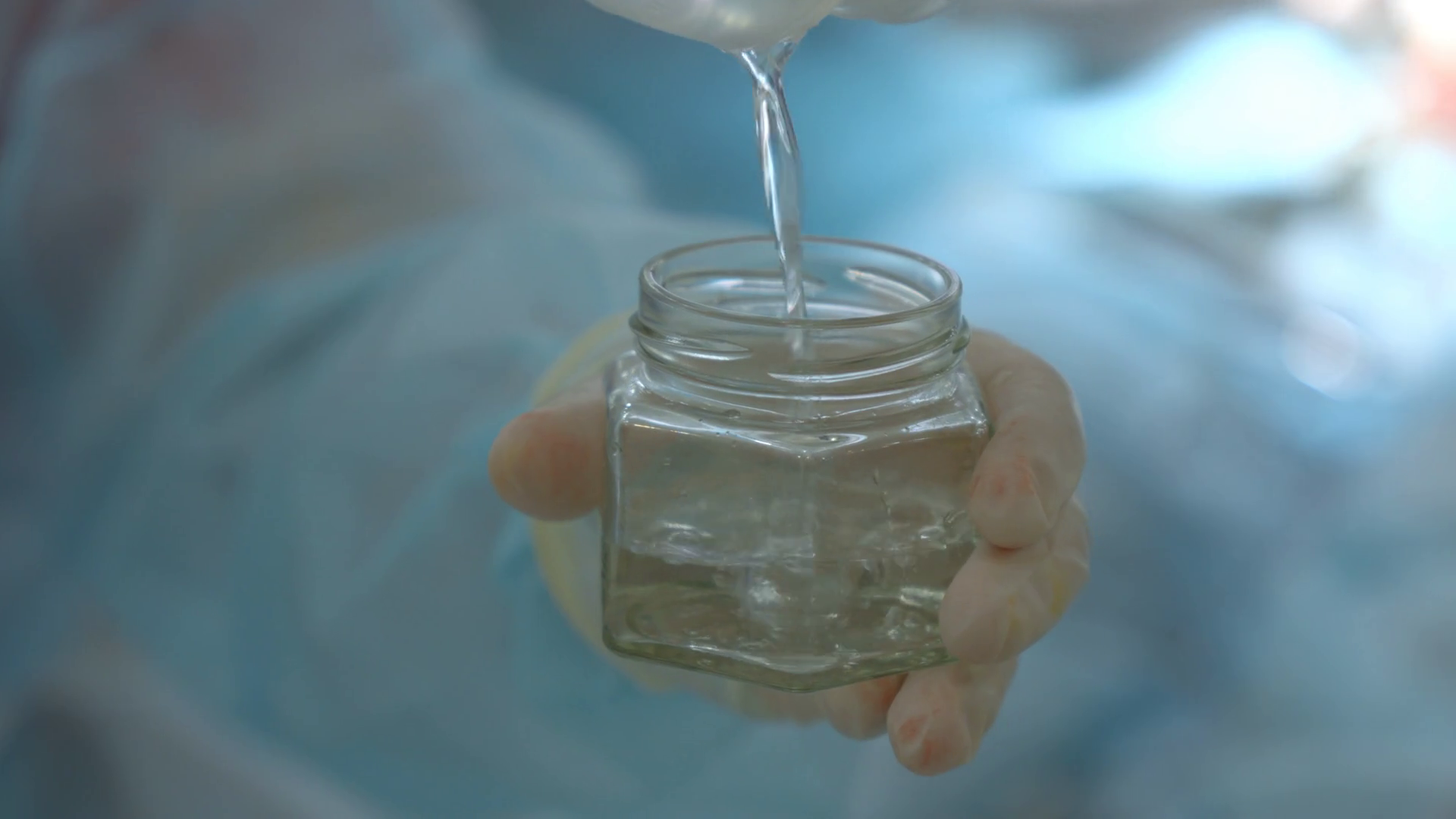 Pouring Sterile Liquid Into Small Container Stock Footage SBV348595067