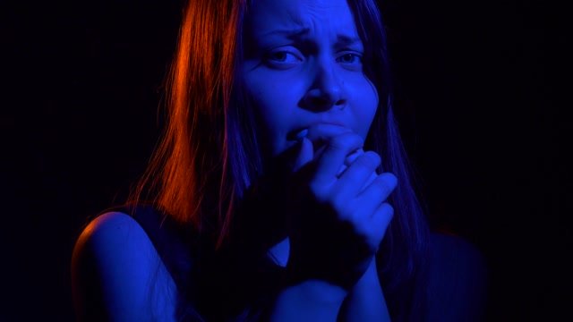 Scared Woman In Dark Stock Footage: Royalty-Free Video Clips - Storyblocks