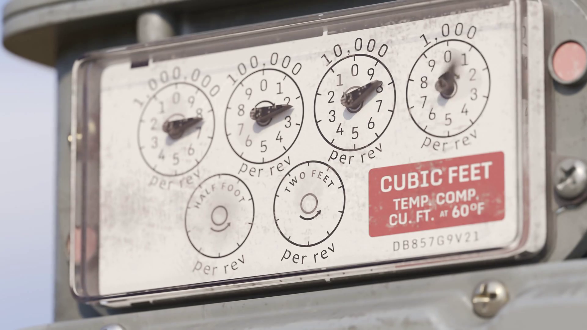 Gas meter showing fuel flow in a timelapse. Measurement gauges blurred