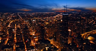 Spectacular Scenery of Luminous Chicago Illinois us in the Evening Spectacular Scenery of Luminous Chicago Illinois us in the Evening Amazing Blue Sky with Clouds and Orange Parts at Backdrop top View | Stock Photo, Background, Lifestyle, Creative Co